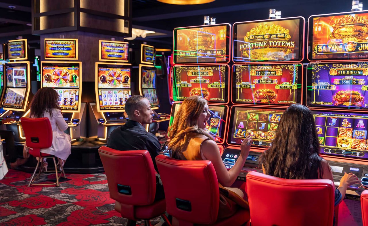 Permainan slot Yggdrasil di togel line menampilkan gulungan dengan simbol berwarna, tombol putar, dan tampilan taruhan